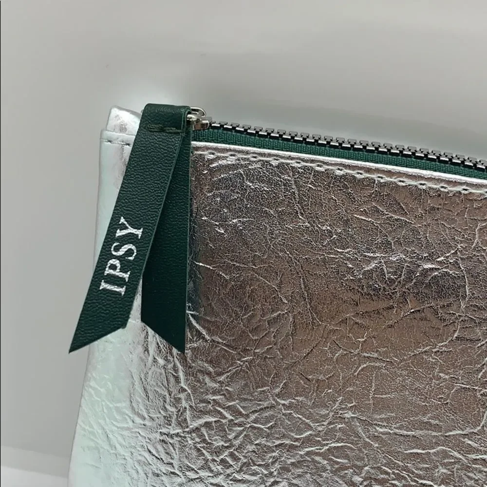 NWT Silver metal foil Cosmetic Bag